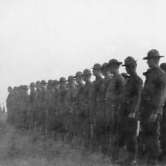 Soldiers of the US Army's 15th Infantry Regiment standing in formation with an officer in front of them.