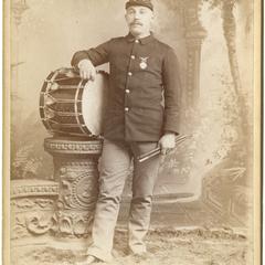 Standing man with drum