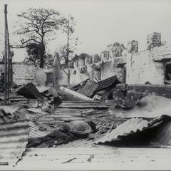 Dead Filipino amid ruins, 1945