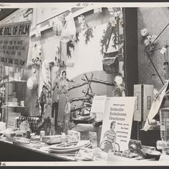A drugstore display promoting film products and summer merchandise