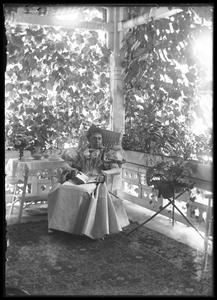 Mrs. F. S. Newell on porch