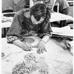 Student working on a batik wall-hanging