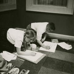 Students drawing during "Let's Draw" radio program