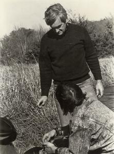 Professor Donald Halloran and a student in a field, University of Wisconsin--Marshfield/Wood County