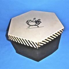 Black hatbox with a white lid