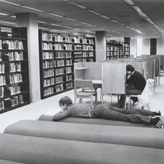 A student reading in the library