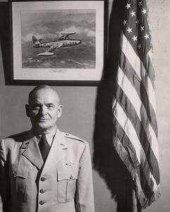 Col. Edwin Archibald with flag