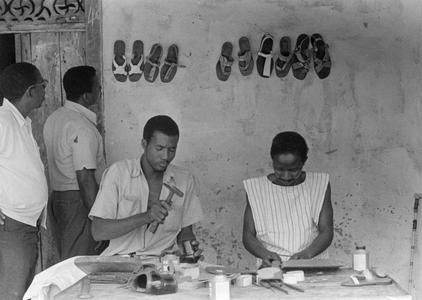 Shoemakers at Work