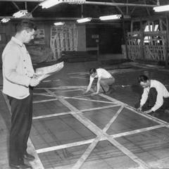 Laying out templates for shipbuilding at Marine Iron & Shipbuilding Co.