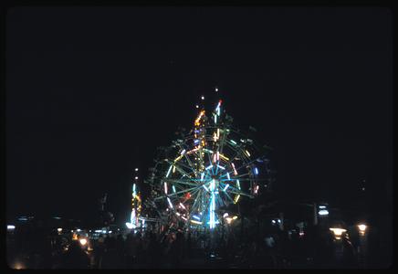That Luang fair : Ferris wheels at night
