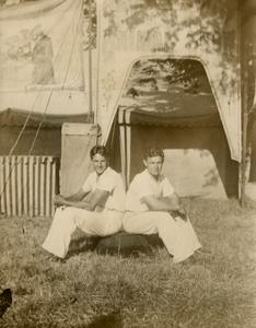 Two circus performers in front of G. W. Hall's Animal Show tent