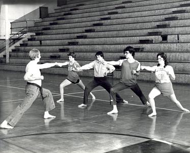 Martial arts students in gym
