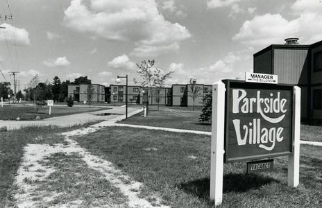 Parkside Village seen from the south with sign