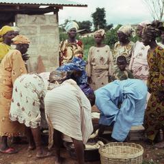 Group of women preparing cassava