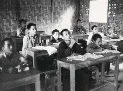 Akha students seated in a classroom in Houa Khong Province