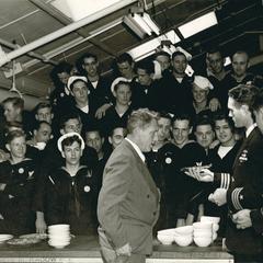 Spencer Tracy in mess hall with commander and crew of submarine Icefish