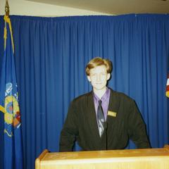 Stout Student Association, Chip Orlikowski standing at podium
