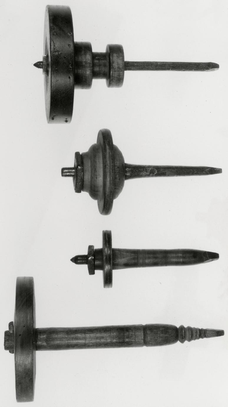 Black and white photograph of lathe spindles (polishing spindles).