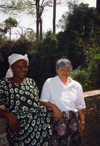 Two women on bridge in Kintampo Falls