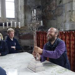 Raising the silver cross at Iona Abbey
