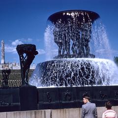 Children in front of a fountain