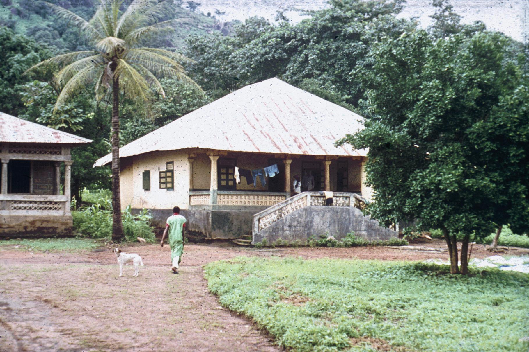 Typical Concrete House with Corrugated Tin Roof (Pan Roof) at Kamabai