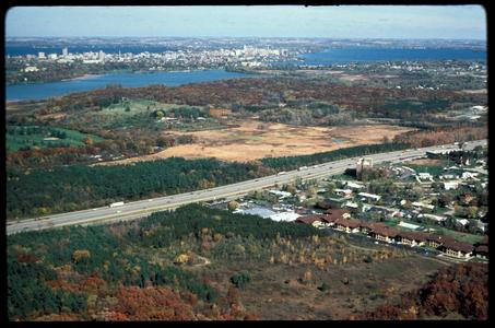 Aerial view of Grady Tract, beltline highway, and most of the University of Wisconsin Arboretum