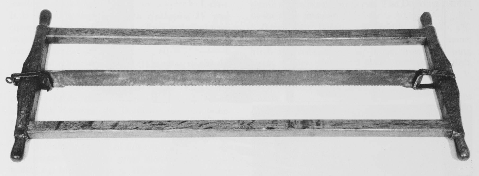 Black and white photograph of a frame or veneer saw.