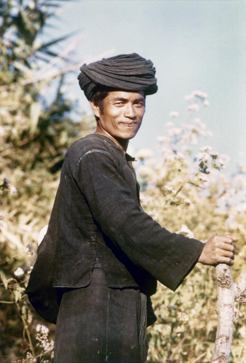 An Akha man works in his field in Houa Khong Province