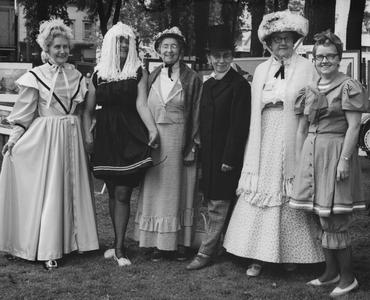 Several women dressed in costumes