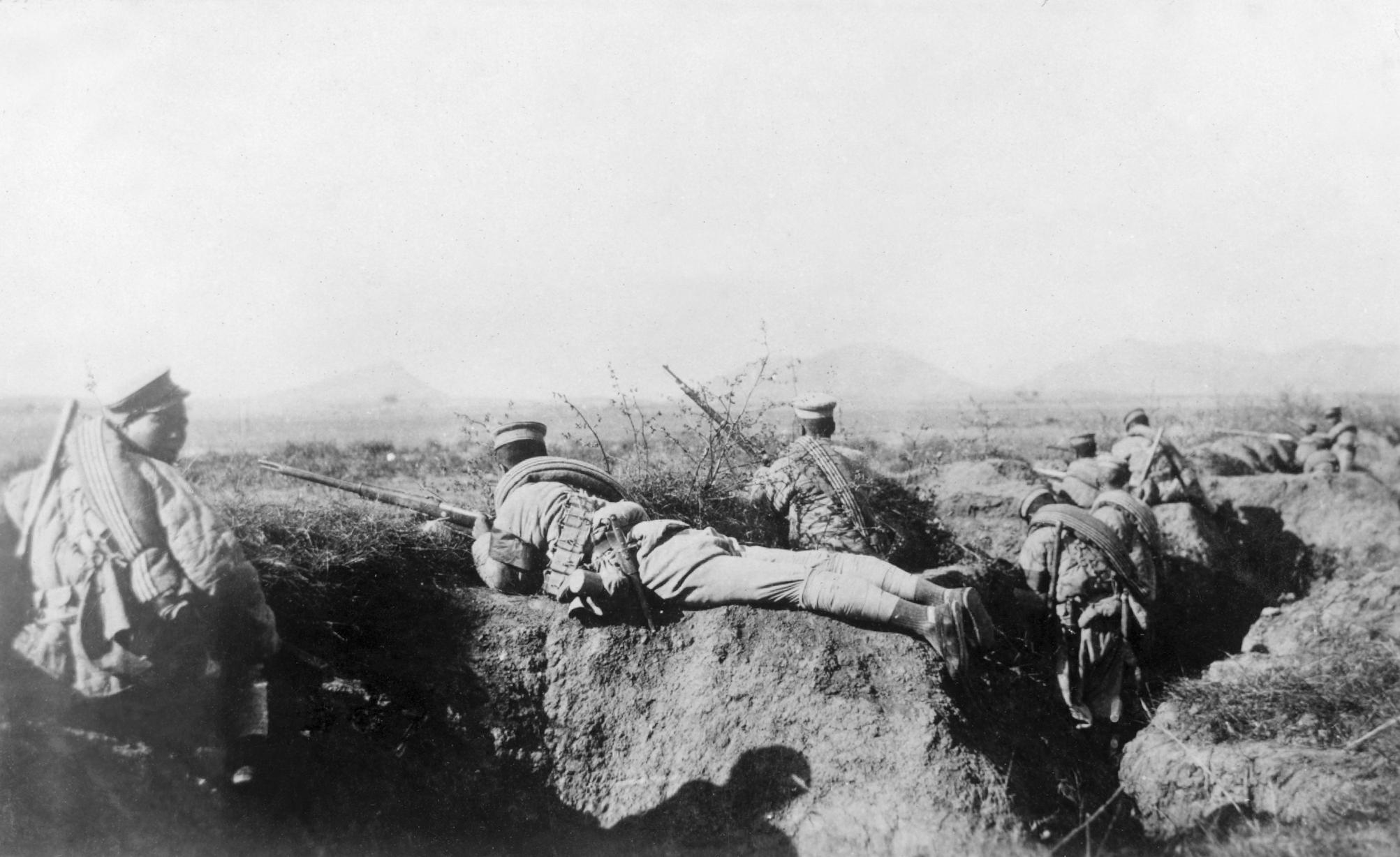 Chinese soldiers in a trench.