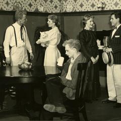 Alpha Psi Omega - Performing a play onstage, dining room scene