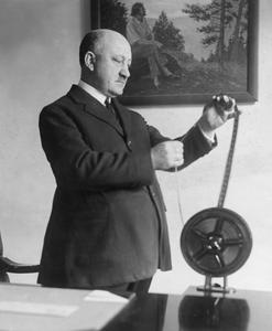 William Young with film reel
