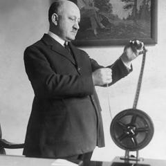 William Young with film reel