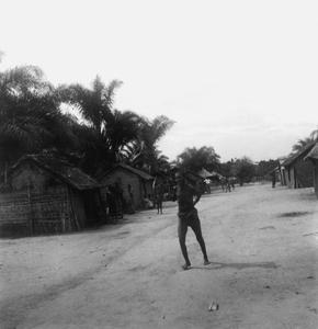 Kuba-Ngeende Woman Running through Streets in Grief