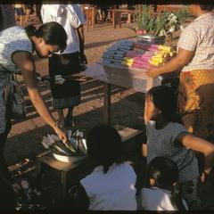 That Luang fair : sidewalk vendors--candles