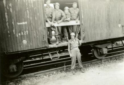 American soldiers waiting in the box cars
