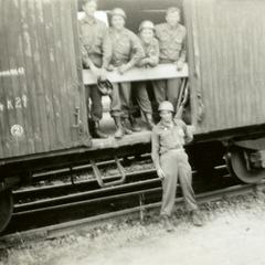 American soldiers waiting in the box cars