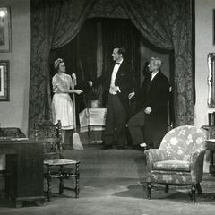 Alpha Psi Omega - Performing a play onstage, living room scene
