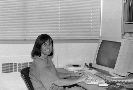 Mary Vernon at her desk