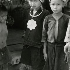 Akha boy and girl in the village of Phate in Houa Khong Province