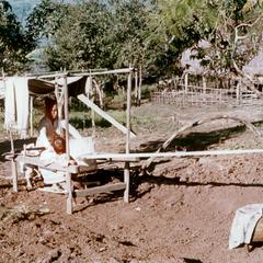 White Lahu (Lahu Hpu) woman weaving in Houa Khong Province