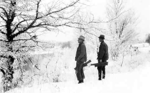 Aldo Leopold and Starker Leopold with shotguns