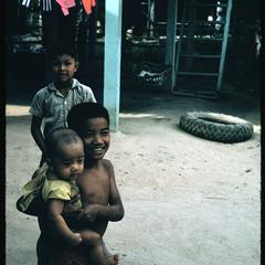 Ban Pha Khao : children--older carrying younger
