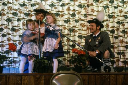 Children sing at Holzhacker Lodge celebration