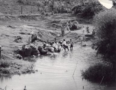 Villagers bathing in the Nam Tang River in Houei Kong Cluster in Attapu Province