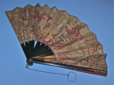 Fabric fan with two women and a man in a boat