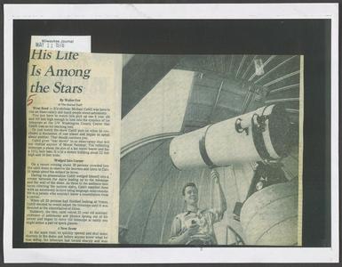 Professor Michael (Mike) Cahill (Physics) using his telescope at the UW-Washington County Center