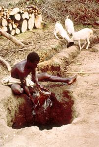 Somali Collecting Water at a Well