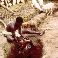 Somali Collecting Water at a Well